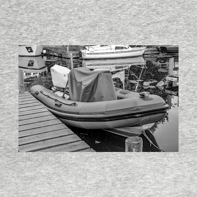 Inflatable dinghy moored up on the Norfolk Broads by yackers1